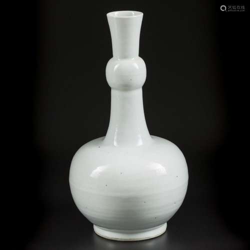 A Dehua blanc de Chine knobbly vase with relief decoration o...