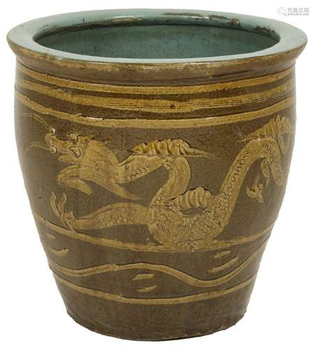 An earthenware cache-pot decorated with dragons. China, 1st ...