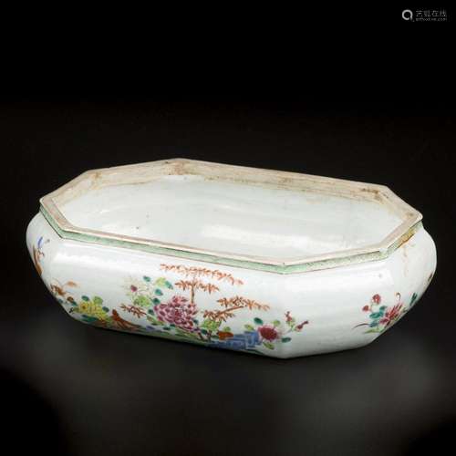 A porcelain famille rose bowl decorated with birds and flowe...