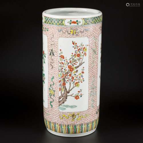 A very large porcelain famille verte cylinder vase decorated...