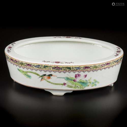 A porcelain famille rose bowl decorated with birds and flowe...