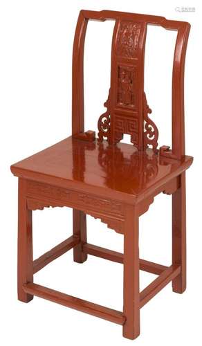 A red painted Chinese chair.