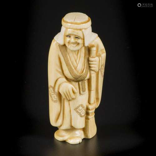 An ivory okimono depicting a sweeper/ happy old man, Japan, ...