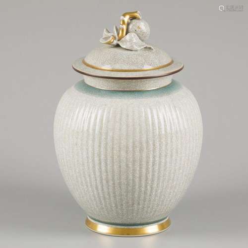 A celadon-style porcelain lidded jar, marked Royal Copenhage...