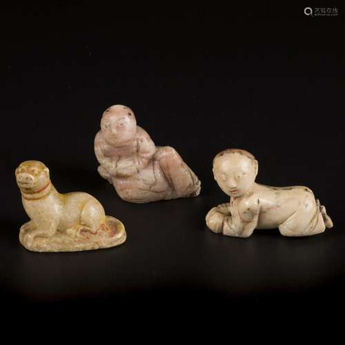 A lot of (3) soapstone figurines in the shape of a crawling ...