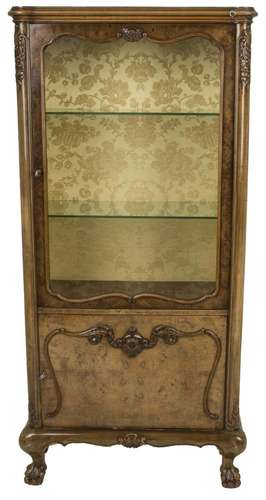 A wallnut veneered Queen Ann style display cabinet on claw f...