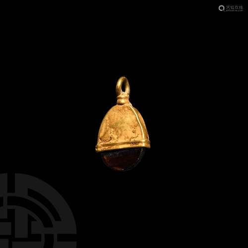 Viking Age Gold and Garnet Pendant