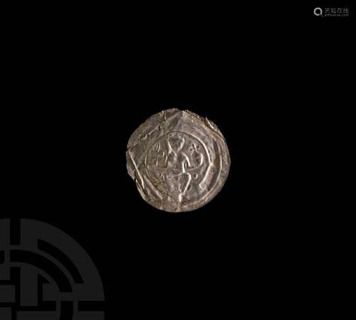 Medieval Silver Bracteate with Seated Figure