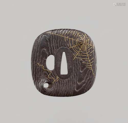 SHOAMI MOTOSHIGE: A RARE IRON TSUBA WITH GOLD SPIDER WEB