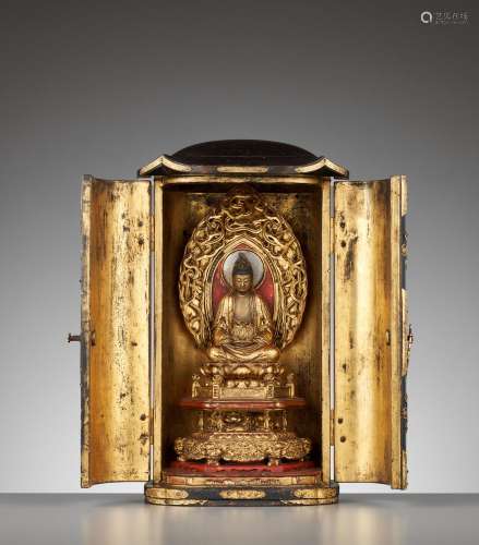 A LACQUER ZUSHI (PORTABLE BUDDHIST SHRINE) WITH KANNON BEHIN...