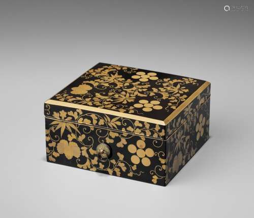 A LACQUER BOX AND COVER WITH MONS