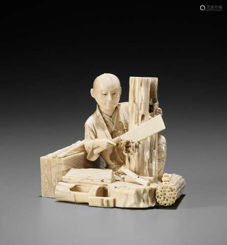 YOSHITOMO: AN IVORY OKIMONO OF A WOODCUTTER AT WORK