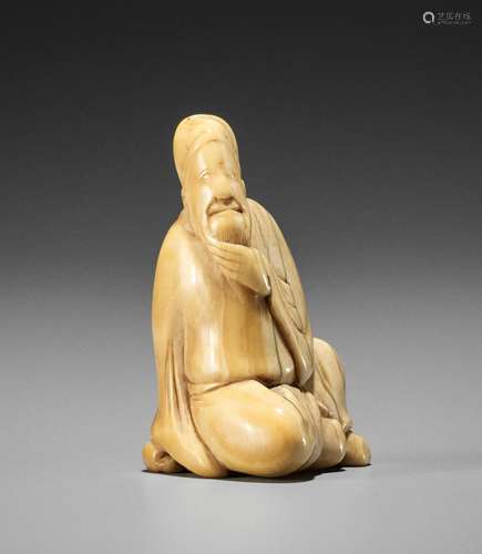 AN IVORY NETSUKE OF A CHINESE SAGE