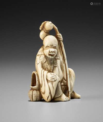 AN EARLY IVORY NETSUKE OF CHOKARO SENNIN