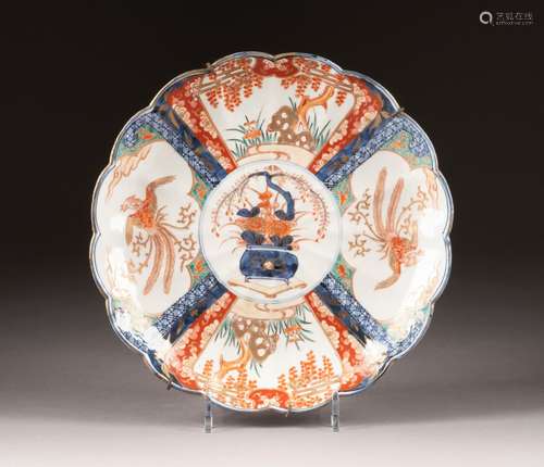 AN IMARI FAMILLE ROSE PLATE