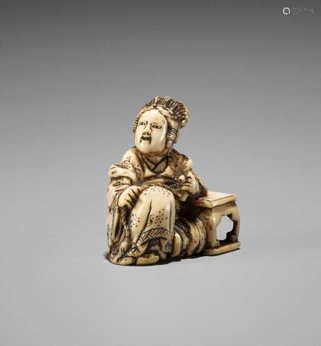 A SMALL IVORY NETSUKE OF A FEMALE IMMORTAL