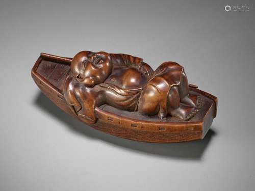 MASATAMI: A LARGE WOOD NETSUKE OF HOTEI LYING ON A BOAT