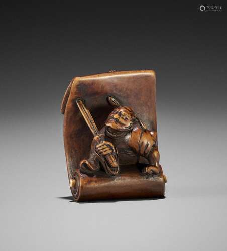 HIDEKAZU: A WOOD NETSUKE OF SHOKI AND ONI ON A SCROLL