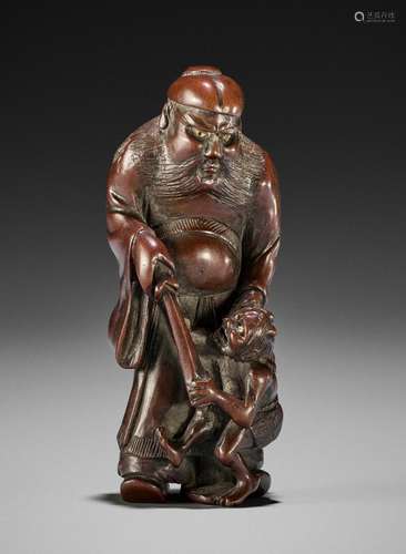 SHUZAN: A LARGE WOOD NETSUKE OF SHOKI AND ONI