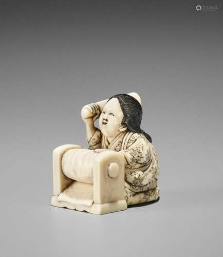 MINKOKU: AN IVORY NETSUKE OF A WOMAN BEATING CLOTH