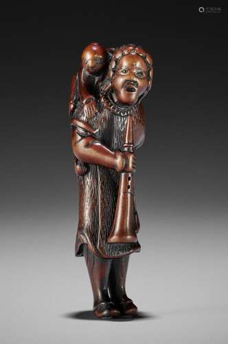 A WOOD NETSUKE OF A DUTCHMAN WITH CHILD