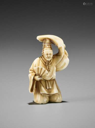 JUSEN: A FINE IVORY NETSUKE OF AN OKINA DANCER