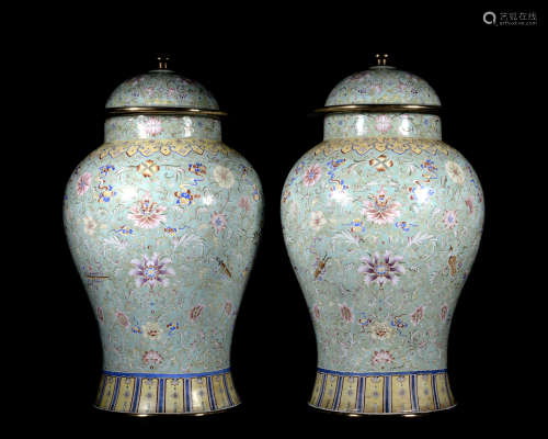 A pair of enamel 'floral' jar and cover