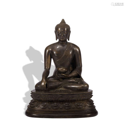 A bronze statue of Pharmacist Buddha