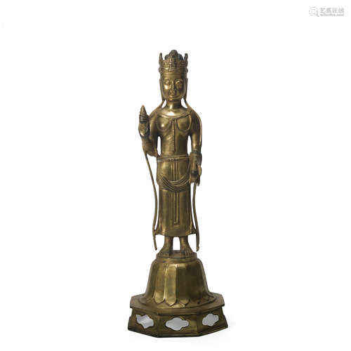 A gilt-bronze statue of buddha