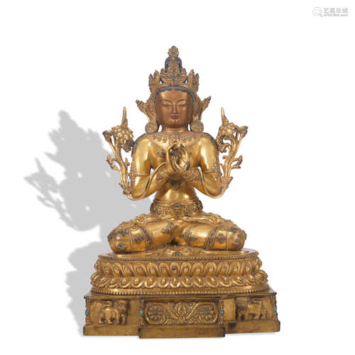 A gilt-bronze statue of Manjusri