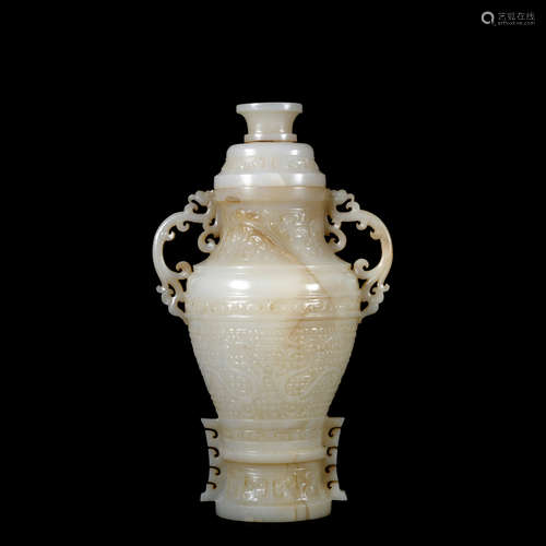 A jade vase and cover