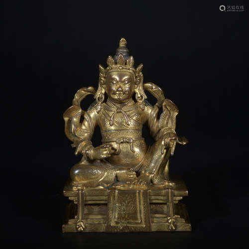 A gilt-bronze statue of Guanyu