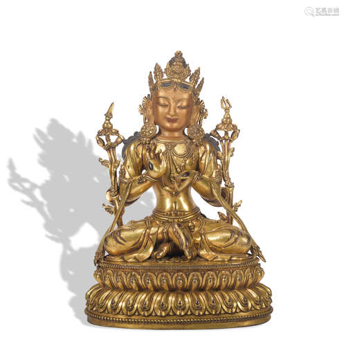 A gilt-bronze statue of Manjusri