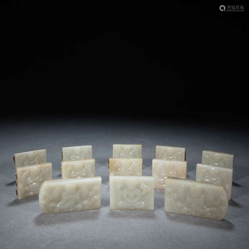 A SET OF CHINESE HETIAN WHITE JADE BELT BRANDS, LIAO DYNASTY