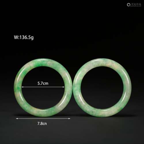 A PAIR OF CHINESE JADE BRACELETS FROM THE QING DYNASTY