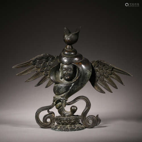 Bronze bird head ornament