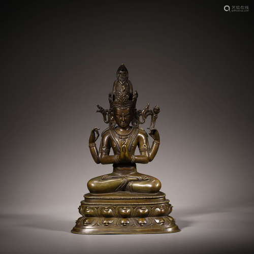 Bronze four-armed Guanyin statue