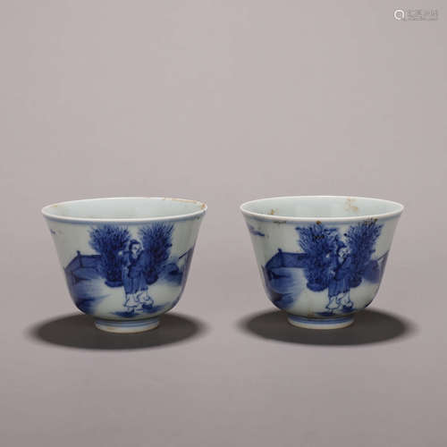 A pair of blue and white figure porcelain cups