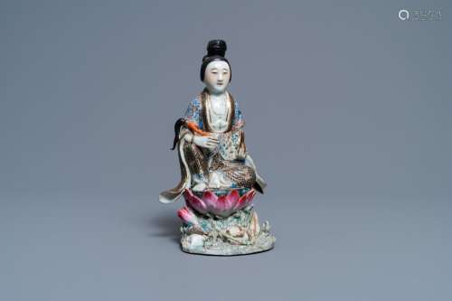 A CHINESE FAMILLE ROSE FIGURE OF A LADY ON A LOTUS THRONE, 1...