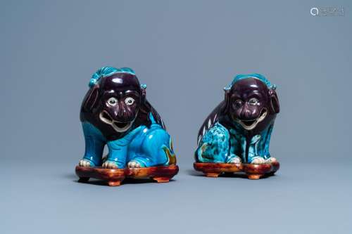A PAIR OF CHINESE TURQUOISE- AND AUBERGINE-GLAZED MODELS OF ...