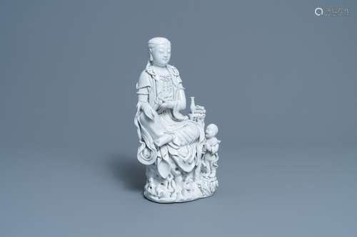 A CHINESE DEHUA BLANC DE CHINE FIGURE OF GUANYIN, HE CHAOZON...