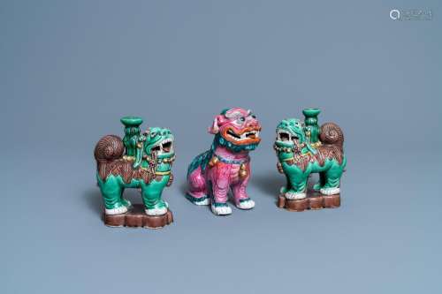 A CHINESE FAMILLE ROSE MODEL OF A BUDDHIST LION AND A PAIR O...