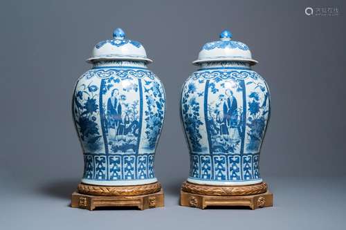 A PAIR OF LARGE CHINESE BLUE AND WHITE COVERED VASES, 19TH C...