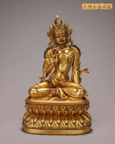 A copper Guanyin bodhisattva statue