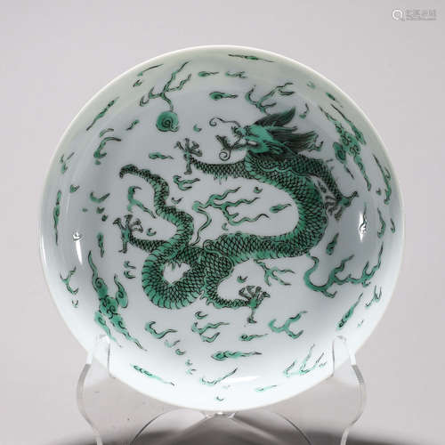 A green glazed cloud and dragon porcelain vase