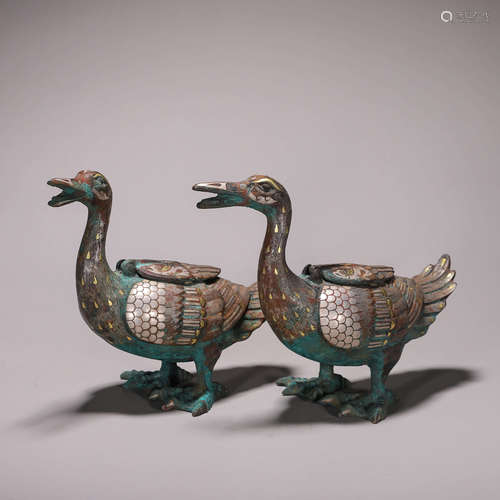 A pair of bronze duck incense burners