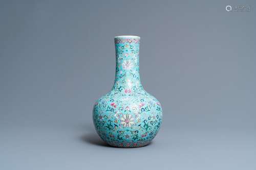 A CHINESE FAMILLE ROSE TURQUOISE-GROUND BOTTLE VASE, QIANLON...