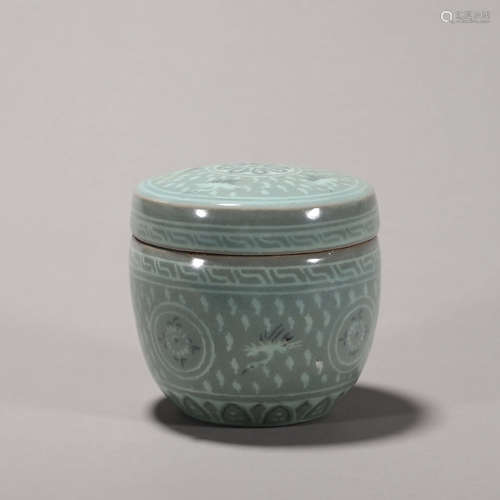 A crane patterned celadon porcelain covered jar