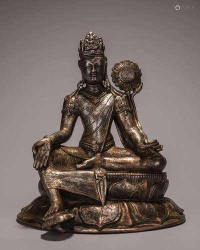 A copper Guanyin bodhisattva statue