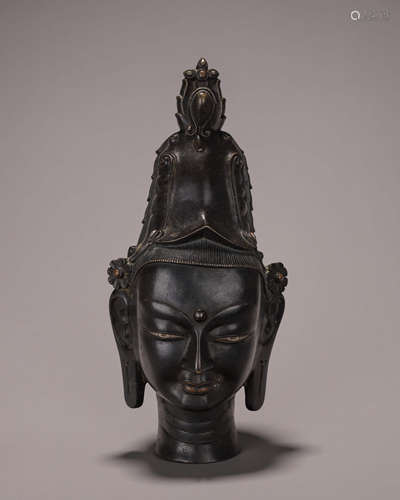 A copper silver-inlaid Guanyin head statue